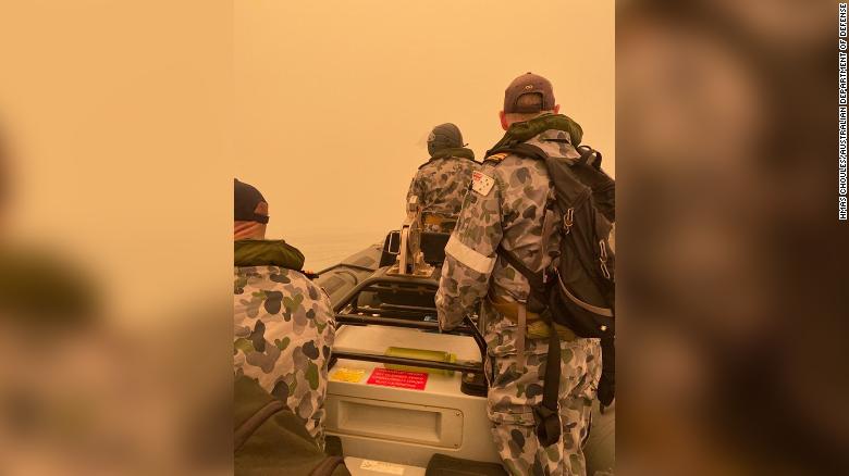 The Australian military assisting with bushfire evacuations.