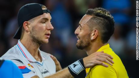 Kyrgios (right) defeated Jan-Lennard Struff in straight sets at the ATP Cup. 