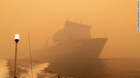 Australian navy vessels conducting evacuation and relief operations in Mallacoota, Victoria.