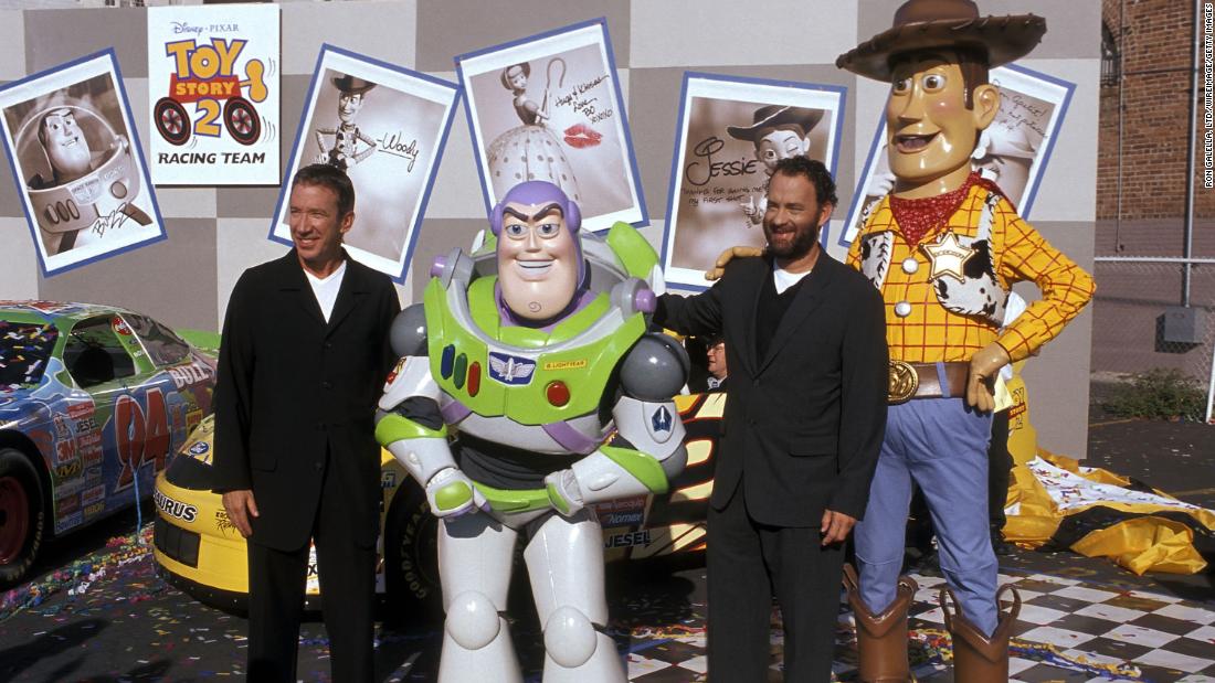 Hanks and Tim Allen pose with their &quot;Toy Story&quot; characters in 1999. The animated franchise has been wildly successful, with three sequels since the first film in 1995.