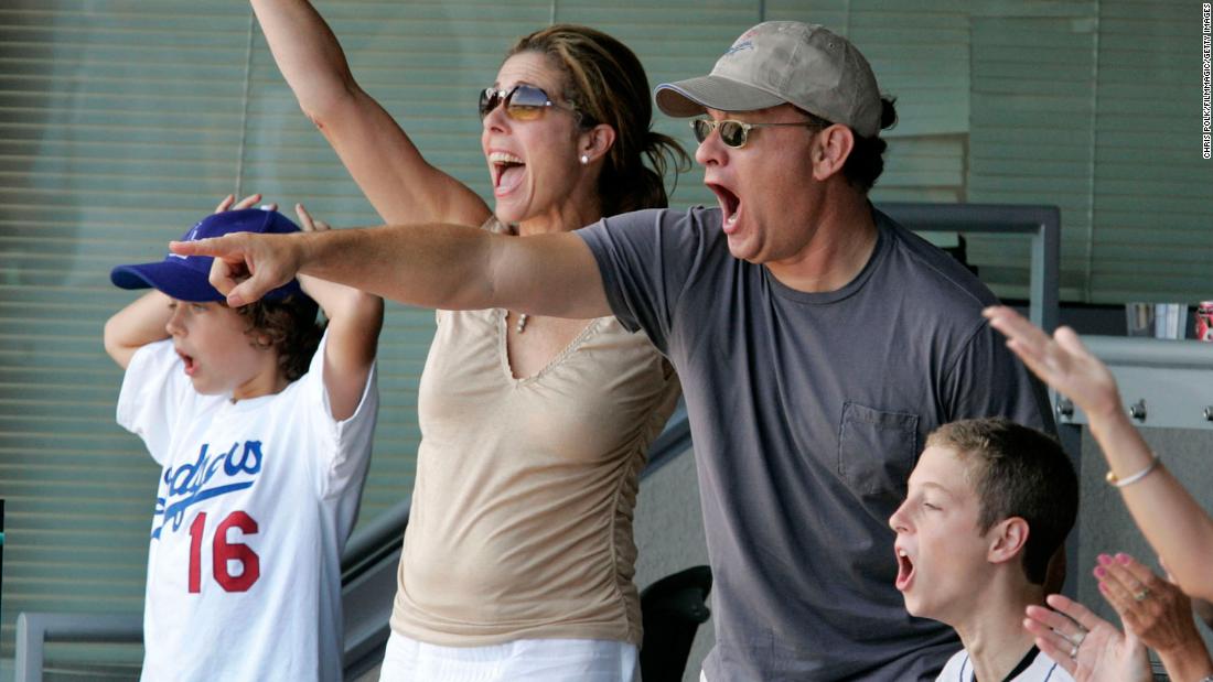 Hanks, his wife and two of his children attend a Los Angeles Dodgers baseball game in 2004. Hanks also has a son and a daughter from his first marriage to Samantha Lewes.