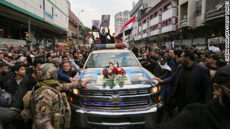 Crowds gather in Baghdad to mourn military leaders killed by US airstrike