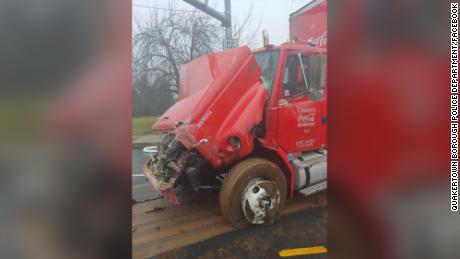 The driver suffered minor injuries while the truck is a total loss.