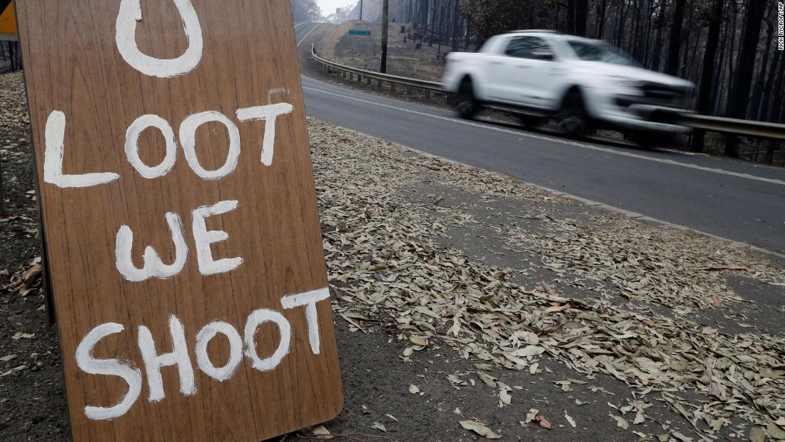 A sign discourages looters near Conjola Park on January 5.