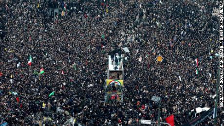 The coffins containing Qasem Soleimani and others killed in the US drone strike are carried in the city of Mashhad, Iran on Sunday.