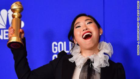 US actress Awkwafina poses in the press room with the award for Best Performance by an Actress in a Motion Picture - Musical or Comedy during the 77th annual Golden Globe Awards on January 5, 2020, at The Beverly Hilton hotel in Beverly Hills, California. (Photo by FREDERIC J. BROWN / AFP) (Photo by FREDERIC J. BROWN/AFP via Getty Images)