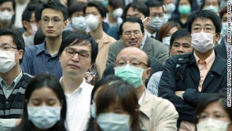 Coronavirus spreads to Beijing as China confirms 139 new cases over the weekend