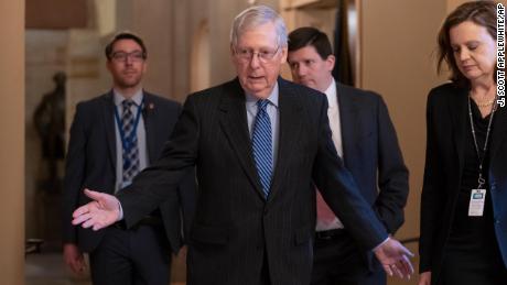 Senate Majority Leader Mitch McConnell, R-Ky., arrives for a closed meeting with fellow Republicans as he strategizes about the looming impeachment trial of President Donald Trump, at the Capitol in Washington, Tuesday, Jan. 7, 2020. 