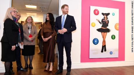 Prince Harry and  Meghan, Duchess of Sussex, view a special exhibition of art by indigenous Canadian artist Skawennati.