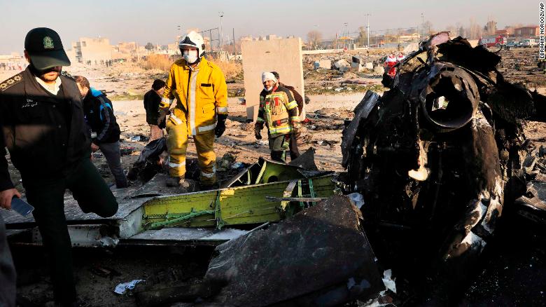 Iranian authorities are working through the debris at the crash site south-west of Tehran.