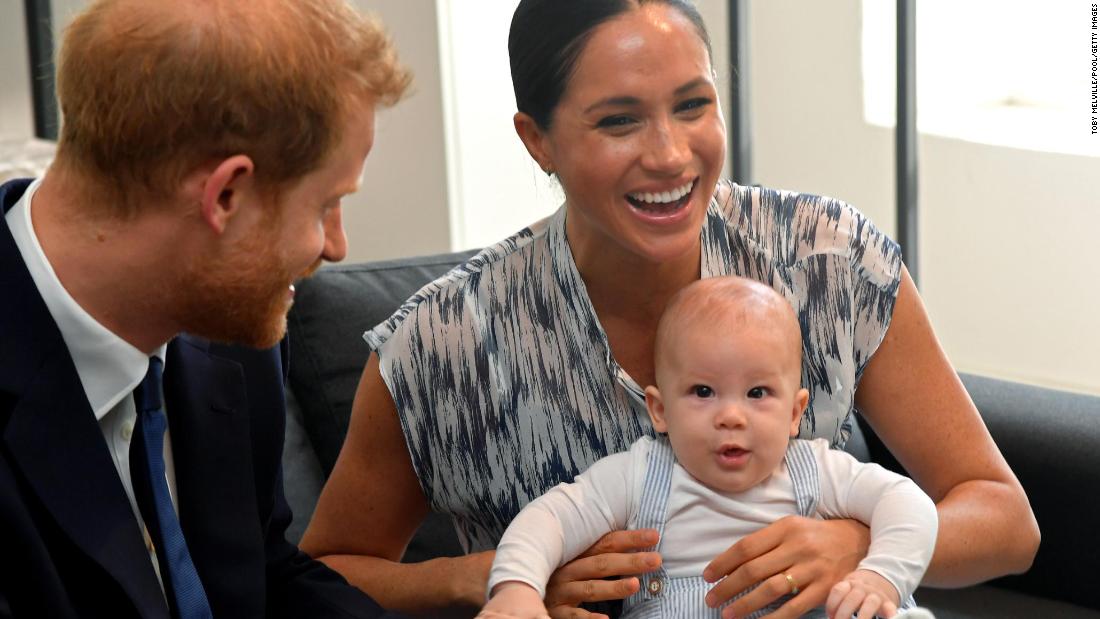 Meghan holds Archie during their royal tour of South Africa in September 2019.