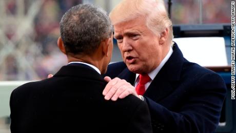 WASHINGTON, DC - JANUARY 20: US President Donald Trump speaks with former President Barack Obama during the Presidential Inauguration at the US Capitol on January 20, 2017 in Washington, DC. Donald J. Trump became the 45th president of the United States today.  (Photo by Saul Loeb - Pool/Getty Images)