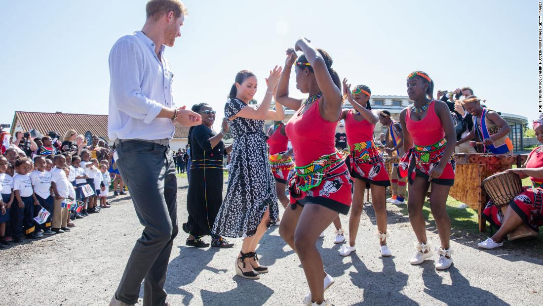 Harry and Meghan dance during the South African tour.