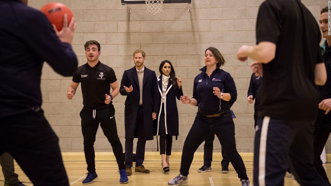 The couple watches Coach Core apprentices take part in a training exercise in Birmingham, England, in March 2018. The Coach Core apprenticeship scheme was designed by the Royal Foundation to train young people to become sports coaches and mentors within their communities.
