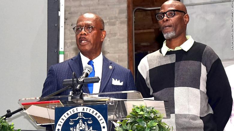 Fulton County District Attorney Paul Howard Jr., left, speaks about his office's new Conviction Integrity Unit on Wednesday, January 8, 2020, in Atlanta. Beside him is Darrell Hall, the unit's first beneficiary.