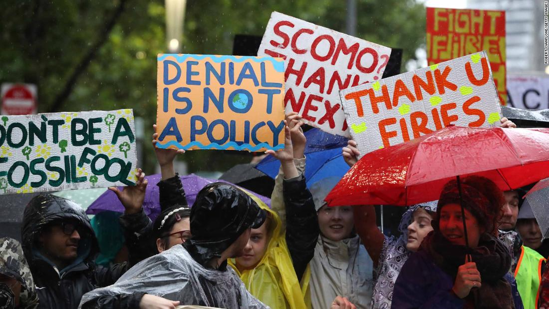 Protesters march through downtown Melbourne on Friday, January 10, in response to the ongoing bushfire crisis.