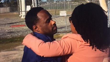 Kerry Robinson, 44, hugs his sister Wednesday, seconds after walking out of the Coffee Correctional Facility in southern Georgia. A judge ordered him released earlier in the day.