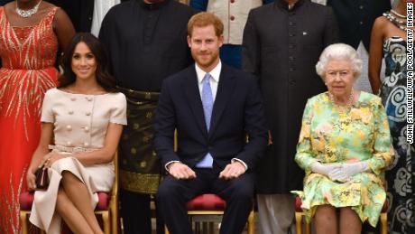 The Queen with Harry and Meghan in 2018. The couple spoke glowingly of the monarch, but admitted their relationship with other royals was fraught.