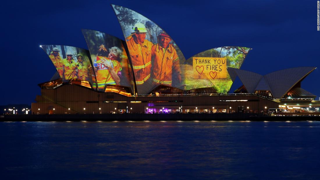 Pictures of firefighters are projected onto the Sydney Opera House on January 11.