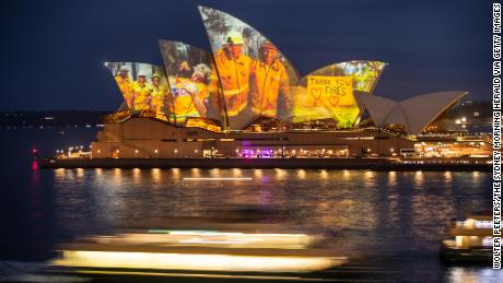 A projection on the Sydney Opera House honors  firefighters on January 11. 
