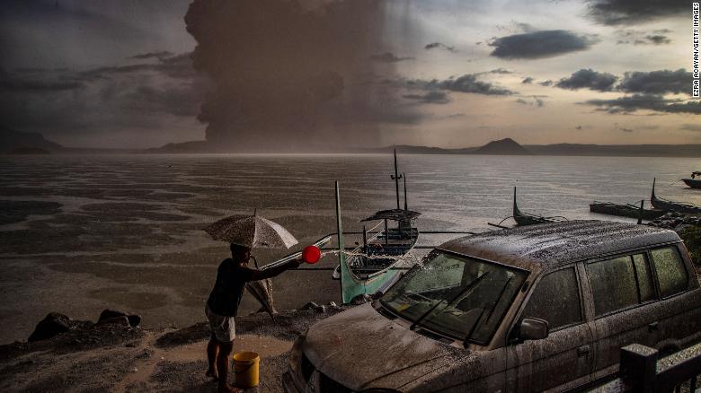 A vehicle covered in ash mixed with rainwater after Taal Volcano erupted on January 12, 2020 in Talisay, Philippines.