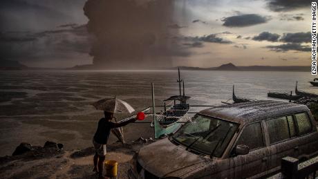 A vehicle covered in ash mixed with rainwater after Taal Volcano erupted on January 12, 2020 in Talisay, Philippines.