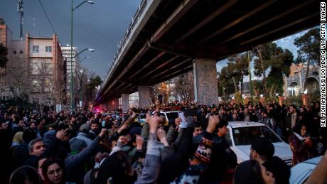 Demonstrators chant during a vigil for the victims of the Ukraine airliner crash in Tehran on January 11.