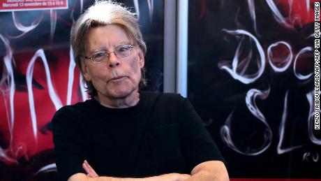 American author Stephen King poses for photographers on November 13, 2013 in Paris, before a book signing event dedicated to the release of his new book &quot;Doctor Sleep&quot;, the sequel to his 1977 novel &quot;The Shining&quot;. The best-selling author has written over 50 novels and sold 350 million copies worldwide.   AFP PHOTO / KENZO TRIBOUILLARD        (Photo credit should read KENZO TRIBOUILLARD/AFP via Getty Images)