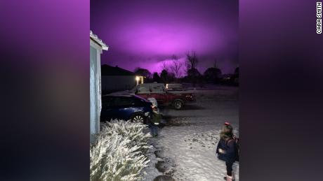 Cara Smith says the grow lights from Copperstone Farms, a medical marijuana farm, reflected off of the fog in Snowflake, Arizona, and turned the early morning sky purple.