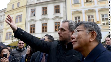 The mayors of Prague and Taipei walk through Prague&#39;s Old Town Square on January 13, 2020.