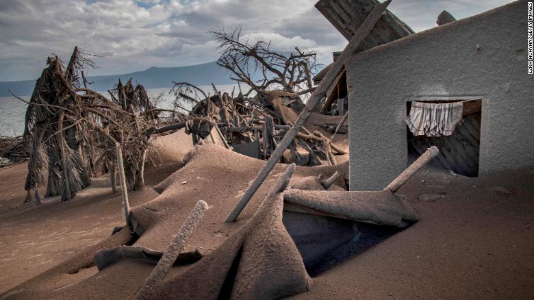 Houses near Taal Volcano&#39;s crater are seen buried in volcanic ash in Taal Volcano Island.