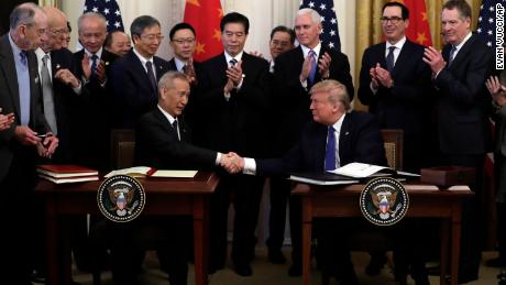 President Donald Trump shakes hands with Chinese Vice Premier Liu He, after signing a trade agreement in the East Room of the White House, Wednesday, Jan. 15, 2020, in Washington. (AP Photo/Evan Vucci)