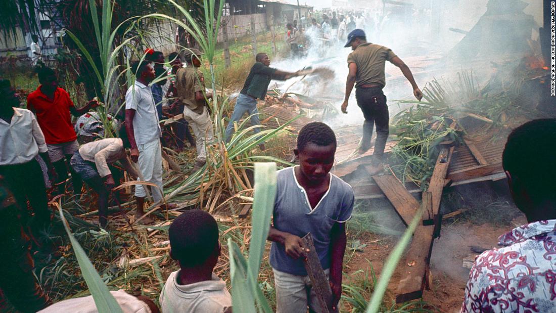 People search the rubble following a bombing raid in Owerri in 1969.