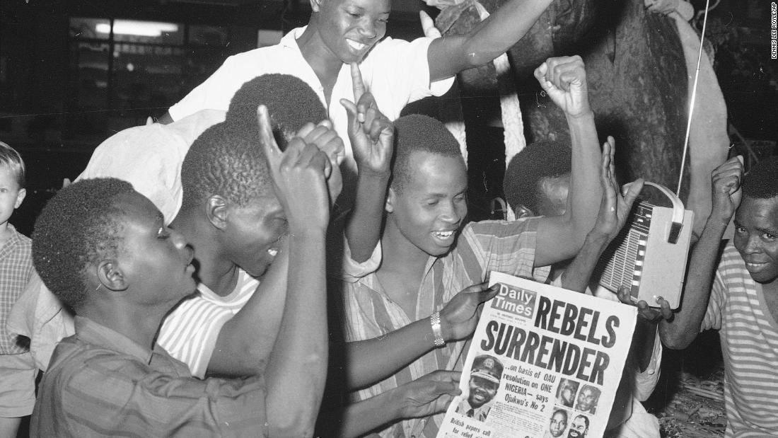 Nigerians in the capital city of Lagos cheer the surrender of the Biafran forces on January 12, 1970. Nigerian leader Maj. Gen. Yakubu Gowon accepted the Biafran surrender and asked all Nigerians to greet the former rebels as brothers.