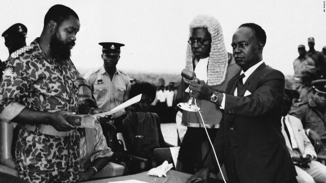 Lt. Col. Odumegwu Ojukwu, left, takes the oath of office shortly after a declaration of independence and the formation of the new state of Biafra on June 10, 1967.