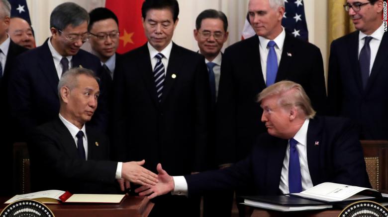 President Donald Trump shakes hands with Chinese Vice Premier Liu He, after signing a trade agreement in the East Room of the White House, Wednesday, Jan. 15, 2020, in Washington. (AP Photo/Evan Vucci)