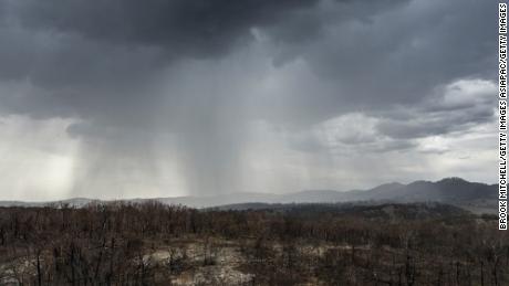 Rain falls on drought and fire-ravaged country near the city of Tamworth, New South Wales.