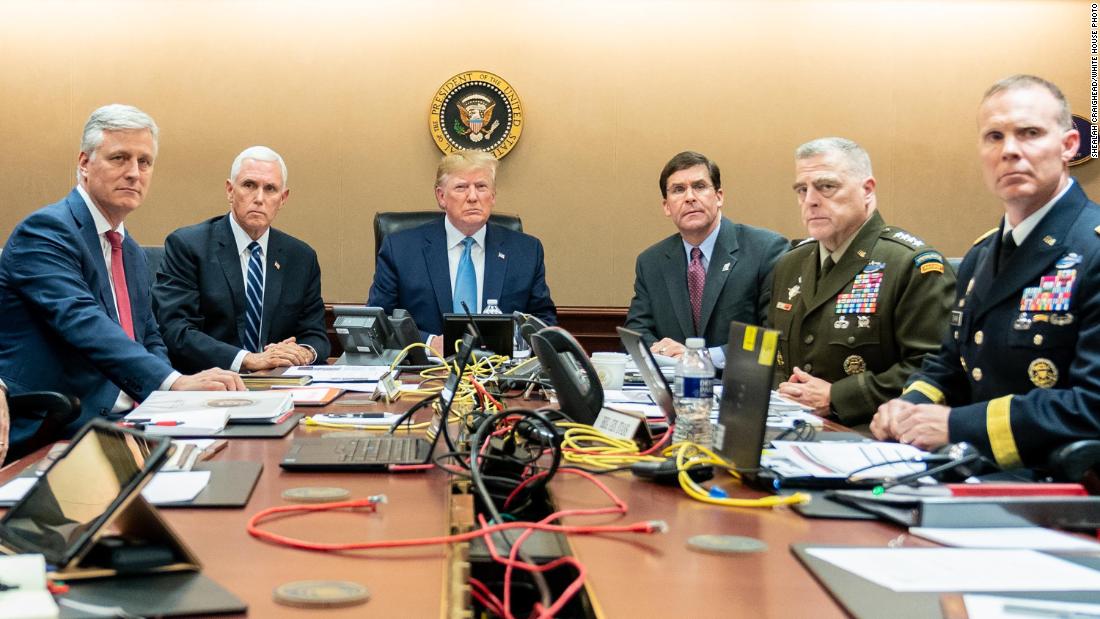 In this photo released by the White House, President Trump sits in the White House Situation Room, monitoring developments in the October 2019 military raid that killed ISIS leader Abu Bakr al-Baghdadi in northwest Syria. From left are national security adviser Robert O&#39;Brien; Pence; Trump; Defense Secretary Mark Esper; Gen. Mark Milley, the chairman of the Joint Chiefs of Staff; and Brig. Gen. Marcus Evans, the deputy director for special operations on the Joint Staff.