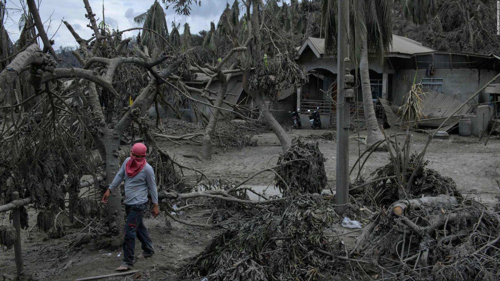 Philippine volcano: Authorities evacuate thousands as Taal spews mile ...