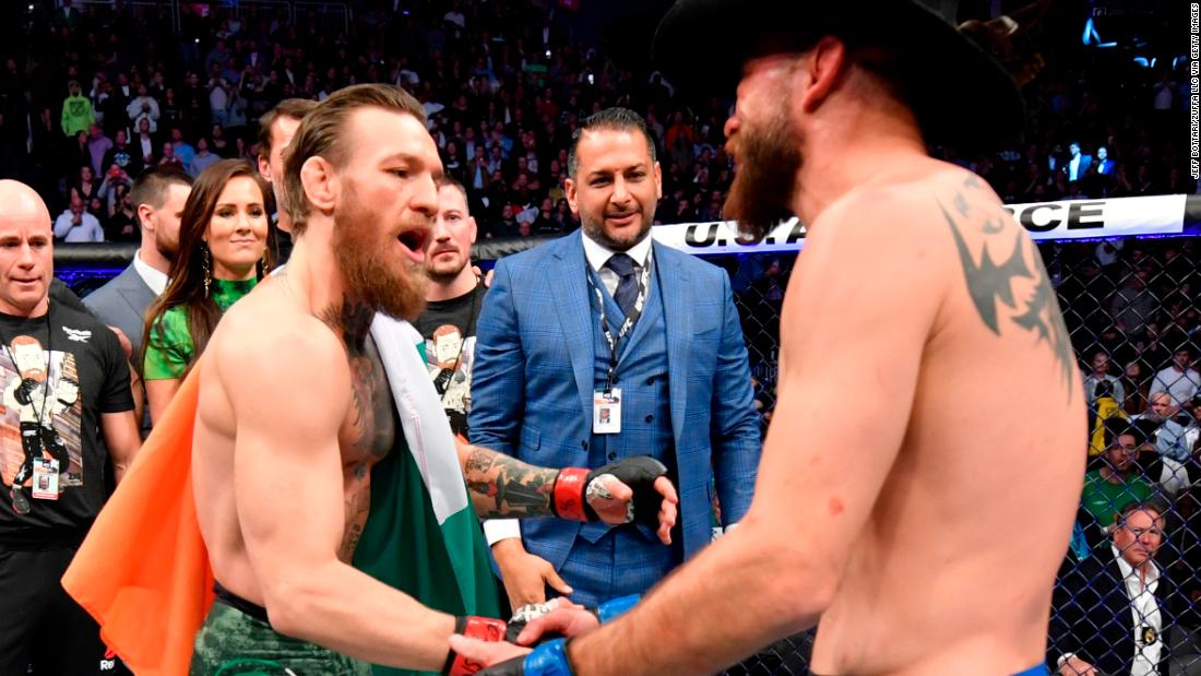 McGregor and Cerrone shake hands after their welterweight fight.