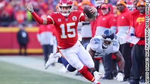 Norma Hunt kisses Lamar Hunt Trophy after Chiefs reach Super Bowl