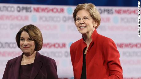 Democratic presidential candidate Sen. Elizabeth Warren (D-MA) (R) and Sen. Amy Klobuchar (D-MN)) walk on the stage after the Democratic presidential primary debate at Loyola Marymount University on December 19, 2019 in Los Angeles, California. Seven candidates out of the crowded field qualified for the 6th and last Democratic presidential primary debate of 2019 hosted by PBS NewsHour and Politico.