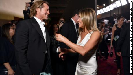 Exes Brad Pitt (left) and Jennifer Aniston share a moment at the 26th Annual Screen Actors Guild Awards at The Shrine Auditorium on January 19 in Los Angeles.