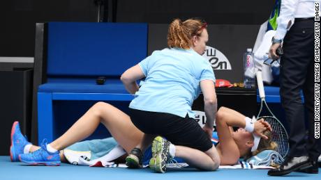 MELBOURNE, AUSTRALIA - JANUARY 22: Dayana Yastremska of Ukraine receives medical treatment during her Women&#39;s Singles second round match against Caroline Wozniacki of Denmark on day three of the 2020 Australian Open at Melbourne Park on January 22, 2020 in Melbourne, Australia. (Photo by Quinn Rooney/Getty Images)