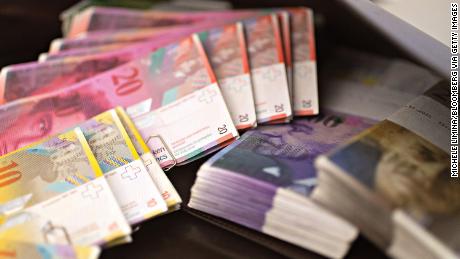 The rich have had enough of negative interest rates. Some are pulling cash out of Swiss banks