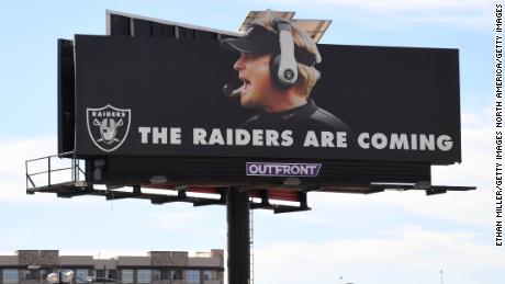 A sign advertises the Raiders&#39; arrival in Las Vegas in 2018.