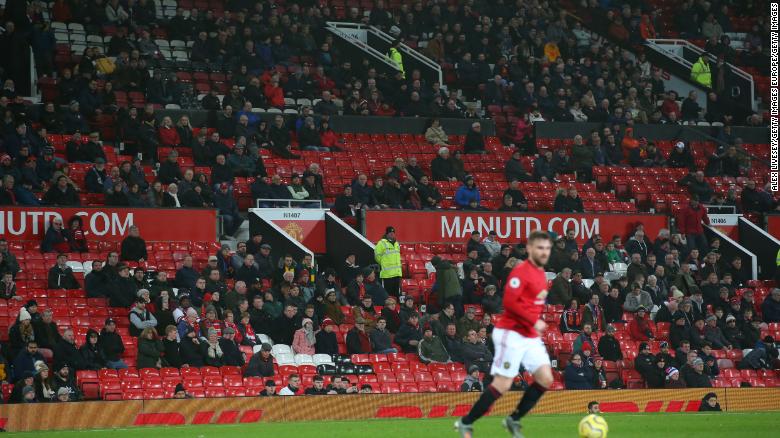 Empty seats are seen around Old Trafford during the match between Manchester United and Burnley.