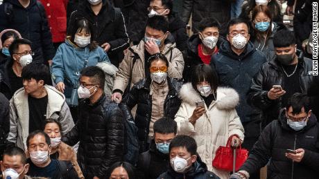 Chinese passengers, almost all wearing protective masks, arrive to board trains at before the annual Spring Festival at a Beijing railway station on January 23, 2020 in Beijing, China. The number of cases of a deadly new coronavirus rose to over 500 in mainland China Wednesday as health officials locked down the city of Wuhan in an effort to contain the spread of the pneumonia-like disease. Medicals experts have confirmed that the virus can be passed from human to human. In an unprecedented move, Chinese authorities put travel restrictions on the city of 11 million and two other neighboring cities, preventing people from leaving after 10 AM local time Thursday. The number of those who have died from the virus in China climbed to at least 17 on Thursday and cases have been reported in other countries including the United States,Thailand, Japan, Taiwan and South Korea. 