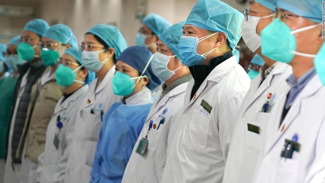 Medical staff of Wuhan&#39;s Union Hospital attend a gathering on January 22, 2020.