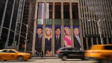 NEW YORK, NY - MARCH 13: Traffic on Sixth Avenue passes by advertisements featuring Fox News personalities, including Bret Baier, Martha MacCallum, Tucker Carlson, Laura Ingraham, and Sean Hannity, adorn the front of the News Corporation building, March 13, 2019 in New York City. On Wednesday the network's sales executives are hosting an event for advertisers to promote Fox News. Fox News personalities Tucker Carlson and Jeanine Pirro have come under criticism in recent weeks for controversial comments and multiple advertisers have pulled away from their shows. (Photo by Drew Angerer/Getty Images)